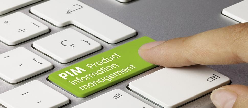 keyboard with a green button saying PIM Product Information management